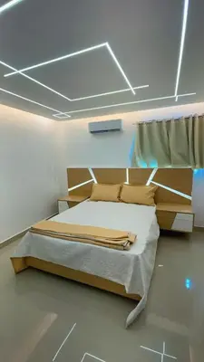 a bedroom with a bed in a room at Apartment in the heart of Santiago in Santiago de los Caballeros