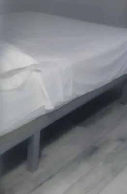 a close up of a bed in a room at Private studio apartment with eat in kitchen in Bayahibe