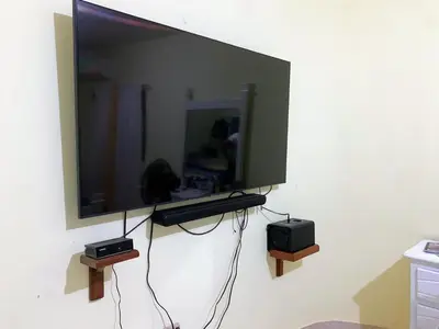 a flat screen tv hanging on a wall at Tu Casa En Pedernales in Pedernales
