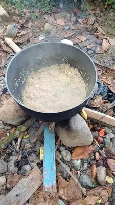a pan sitting on top of a pile of rocks at las taranas villa tropical