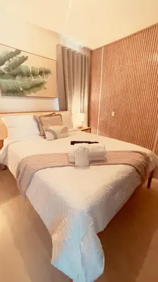 a hotel room with two beds with white sheets at Coral Blue Apartment- Dominicus in La Laguna