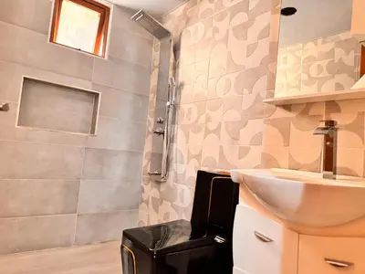 a bathroom with a sink and a shower at Exclusive Huge and Lovely 4 bedrooms and 3 bathrooms apartments in Santiago close to all funs in Santiago de los Caballeros