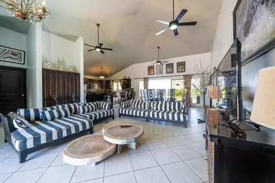 a living room with couches and a coffee table at 6BR, Jacuzzi, Ocean View, Solar Backup Power in Sosúa