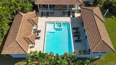 an aerial view of a swimming pool on a house at 6BR, Jacuzzi, Ocean View, Solar Backup Power in Sosúa