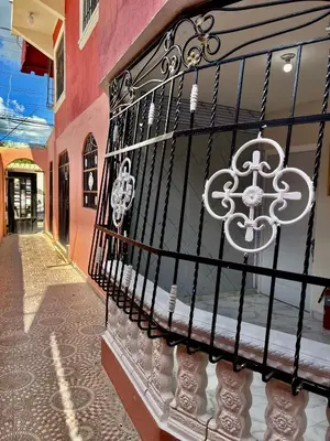 a black wrought iron fence with a snowflake on it at Moderna casa cerca del aeropuerto SDQ y de mi rent cars in La Caleta