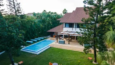 an aerial view of a house with a swimming pool at Chic Villa Pool Casa de Campo in La Romana
