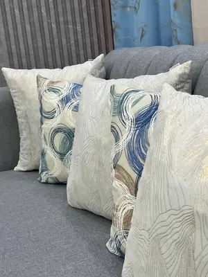 a group of pillows sitting on a couch at Moderna casa seca de aeropuerto SDQ y de mi rent cars in La Caleta