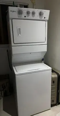 a white stove sitting on top of a refrigerator at Moderna casa cerca de el aeropuerto SDQ y mi rent cars in La Caleta