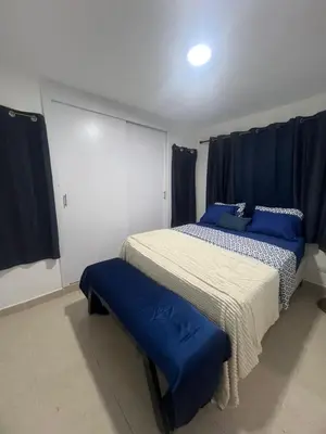 two beds in a room with blue and white at Antares II in San Isidro