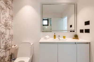a bathroom with a sink and a mirror at Cana Rock Universe in Punta Cana