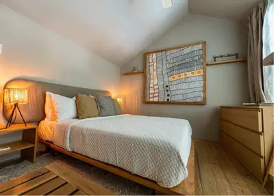 a bedroom with a bed and a window and a dresser at New* 3BR Loft | Pool | Patio | 2 mins to Beach in Las Terrenas