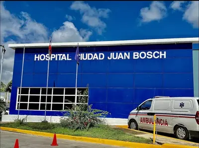 a building with a van parked in front of it at Comfortable apartment near the airport in La Javilla