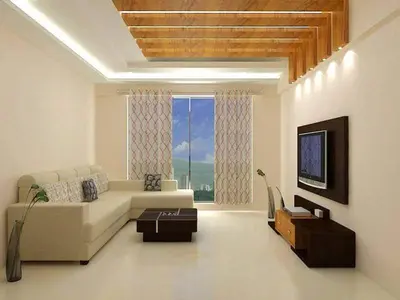 a living room with a couch and a large window at Hotel 3 Hnos in Comendador