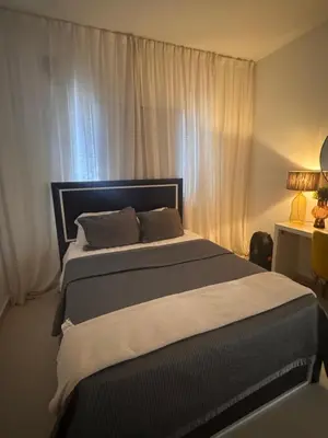a bedroom with a large bed with a window at Luxury Caribbean Oasis, Private Pool & BBQ, 8 Guest in La Romana