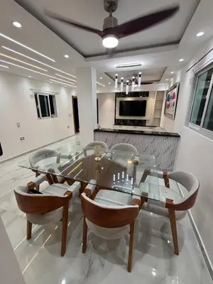 a dining room with a glass table and chairs at villa la pal de 4 in La Ureña