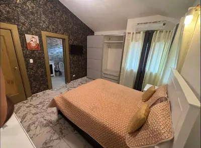 a bedroom with a bed in a room at Villa Us Open in Sosúa