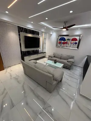 a living room with a couch and a tv at Villa la pal de 4 in La Ureña