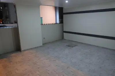 an empty room with white walls and a tile floor at Villa Yvelisse Pop Un paraíso próximo al Mar in San Felipe de Puerto Plata