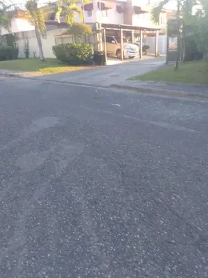 an empty street in a residential neighborhood with a building at Haven Villa Retreat Jacuzzi Oasis for 16 in Mata los Indios
