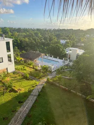 an aerial view of a building with a swimming pool at SunSeaBeach Villa Iguana - 3 SZ - Strandnähe in Las Galeras