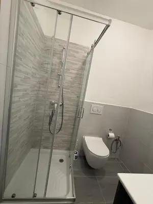 a bathroom with a shower and a toilet at Paradiso Italia Miches in Miches