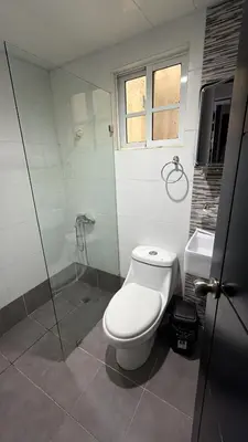 a bathroom with a toilet and a shower at Vacaciones809 in Juan López