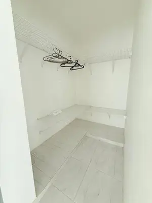 a white room with a white tiled floor at Residencial Marvin I Apartamento 1A in Santiago de los Caballeros