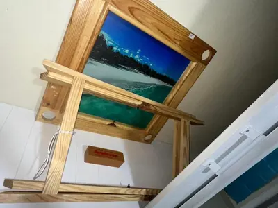 a wooden window on the side of a stairs at Rincón Paraíso Cheché in Dajabón
