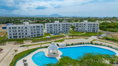 an overhead view of a building and a swimming pool at Work & Relax Studio Pools & Fast Wi-Fi in SOV in Sosúa