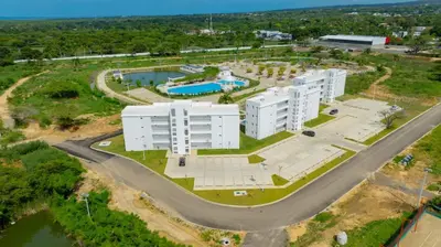an aerial view of a building with a pool at Work & Relax Studio Pools & Fast Wi-Fi in SOV in Sosúa