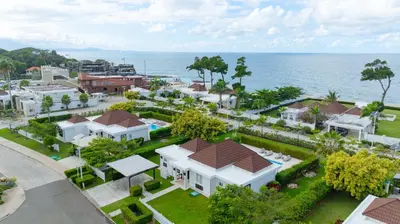 an aerial view of a resort with the ocean at Luxury 2BR Villa next to Santa Fe in Sosúa