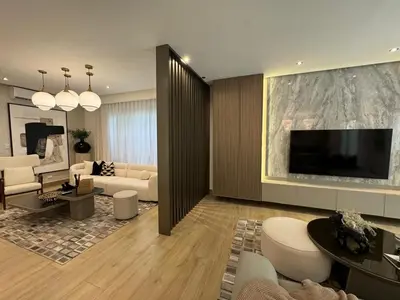 a living room with a large flat screen tv at Luxury Villa in Punta Cana in Punta Cana