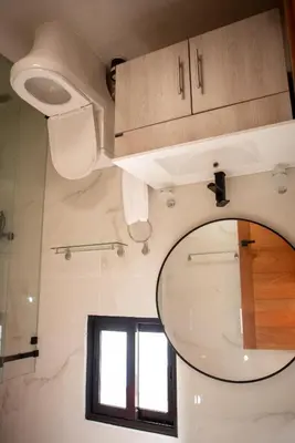 a bathroom with a sink and a mirror at Presmita rose 24 in Punta Cana