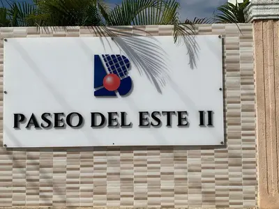a sign for a paseo del estico ii at Comfortable Apartament 20 Minutes from the airport in San Isidro