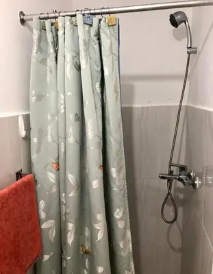 a shower curtain in a bathroom next to a shower at Exclusive Beachside House with Private Backyard in Río San Juan