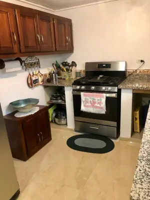 a kitchen with a stove and a counter top at Exclusive Beachside House with Private Backyard in Río San Juan