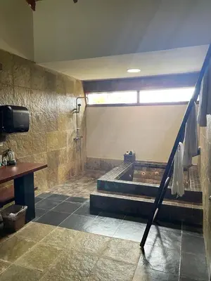 a bathroom with a shower and a bath tub at Residence in Juan Dolió, Guavaberry, is ideal in Los Conucos