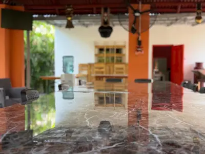 a view of a room with a table and chairs at Rancho Doña Rita in Higuey