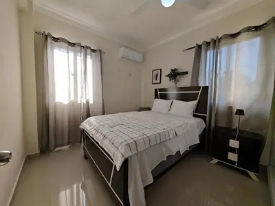 a bedroom with a bed and a window at 2 Bdrm, 1 Bath, Wifi, Near River and Beach, 4R in Paraíso