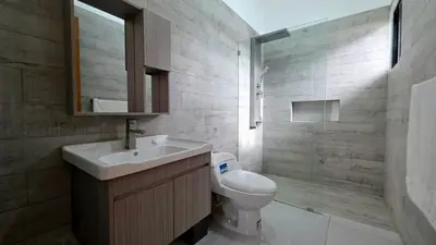 a bathroom with a sink and a toilet and a shower at Ivy Villa Cabarete, fully equipped villa in Cabarete