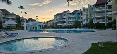 a swimming pool in the middle of a resort at my paradise in Punta Cana
