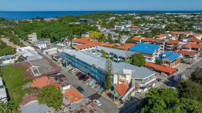 an overhead view of a town with a train at Cheap Hotel Room in Sosua Strip in Sosúa