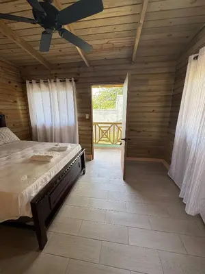 a bedroom with a bed and a ceiling fan at Las Indgenas 6BR Pool Jacuzzi Gazebo in Imbert