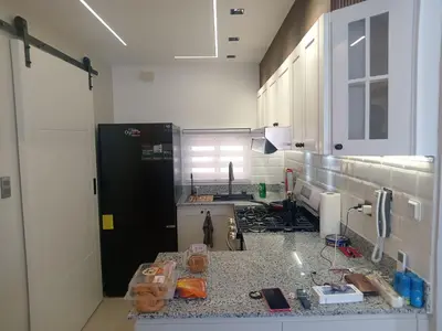 a room with a kitchen with a counter top at Ecológica in Los Paredones
