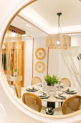 a dining room with a table in a mirror at Aqua Luxe Opulence Vista Piscina & Golf · by Sun5 in Punta Cana