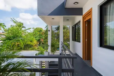 a view from the balcony of a house at Villa Sunrise an elegant private villa in Central Sosua in Sosúa