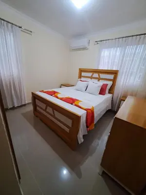 a bedroom with a large bed in a room at Luxurious and comfortable in the safest area in Juan López