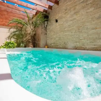 Getaway room with shared Jacuzzi in the center