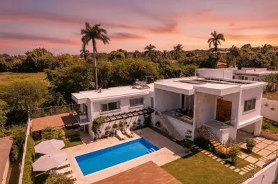 an aerial view of a house with a swimming pool at Stylish Luxury Villa in Sosua- 5BR Suites in Sosúa