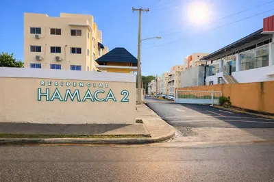 a sign for a pharmaceutical firm in a street at Residential hammock 2, next to the brewery in Concepción de La Vega